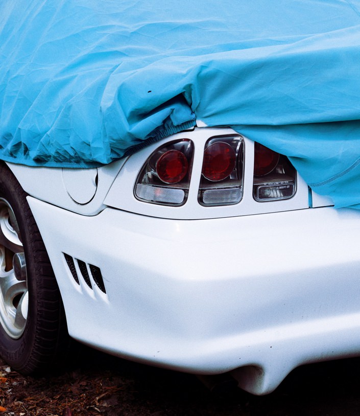 Car stored with cover